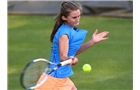 BIRMINGHAM, ENGLAND - JUNE 09:  Katy Dunne of Great Britain returns a shot from Camila Giorgi of Italy on day one of the AEGON Classic Tennis Tournament at Edgbaston Priory Club on June 9, 2014 in Birmingham, England.  (Photo by Tom Dulat/Getty Images)